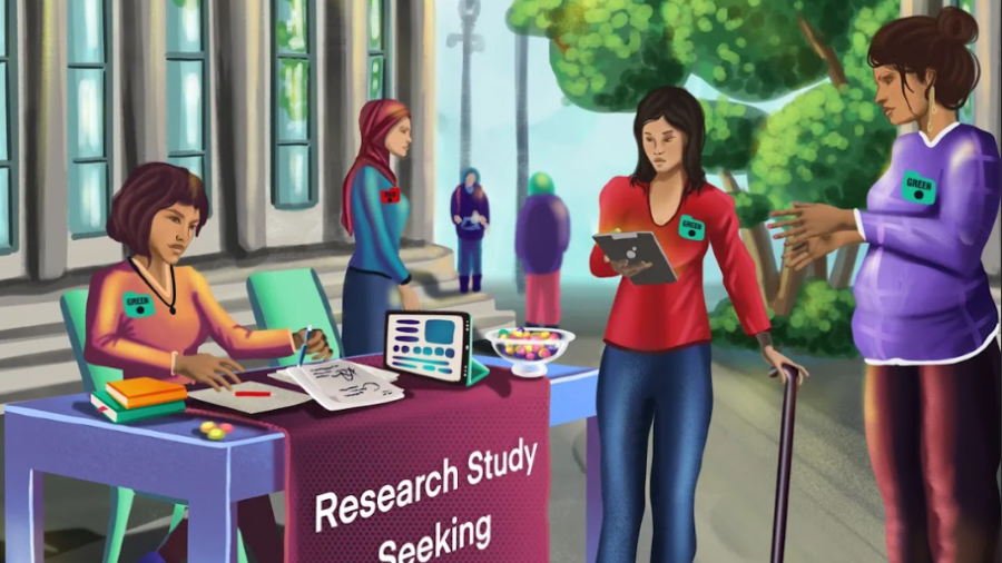 Students are gathered around an informational booth.  The booth has a banner that reads "research study seeks participants"